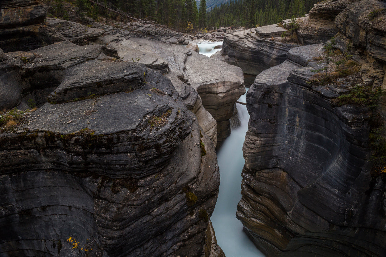 A River Flows through Cascading Over a Rocky Cliff Home Decor Premium Quality Poster Print Choose Your Sizes - Bella Home Decor