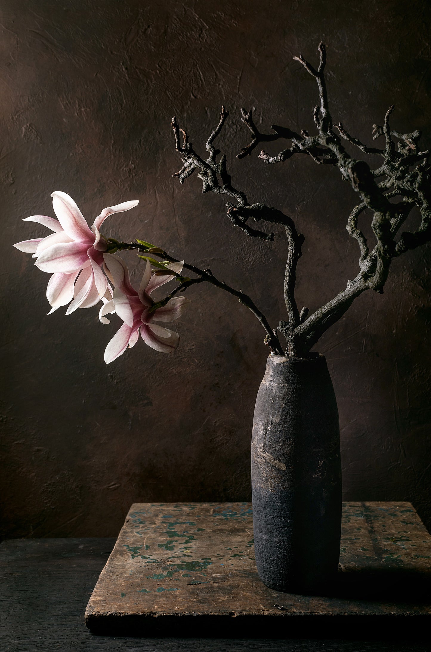 Pink Magnolia Blossoms Ikebana Dark Ceramic Vase 60x90cm Metal Print Ready to Hang