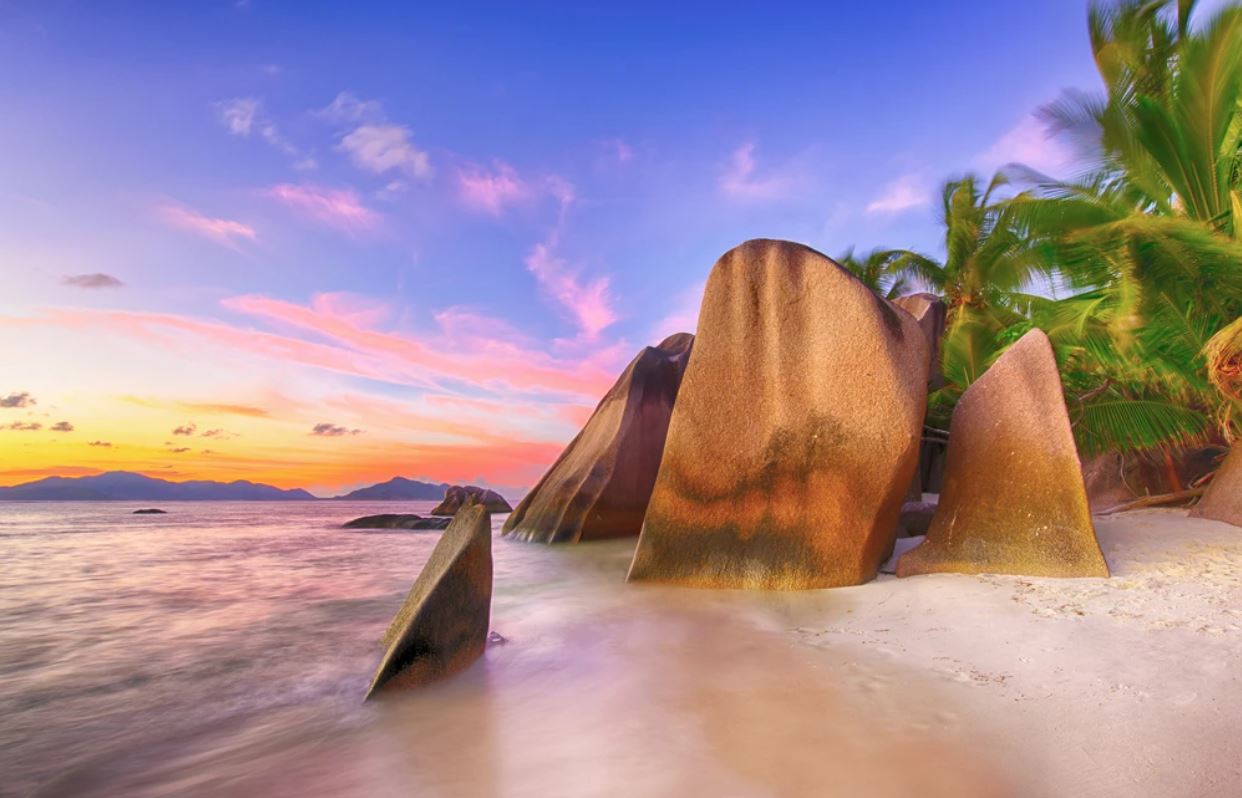 Wallpaper Murals Peel and Stick Removable Stunning Beach with Rocks at Sunset Photograph High Quality