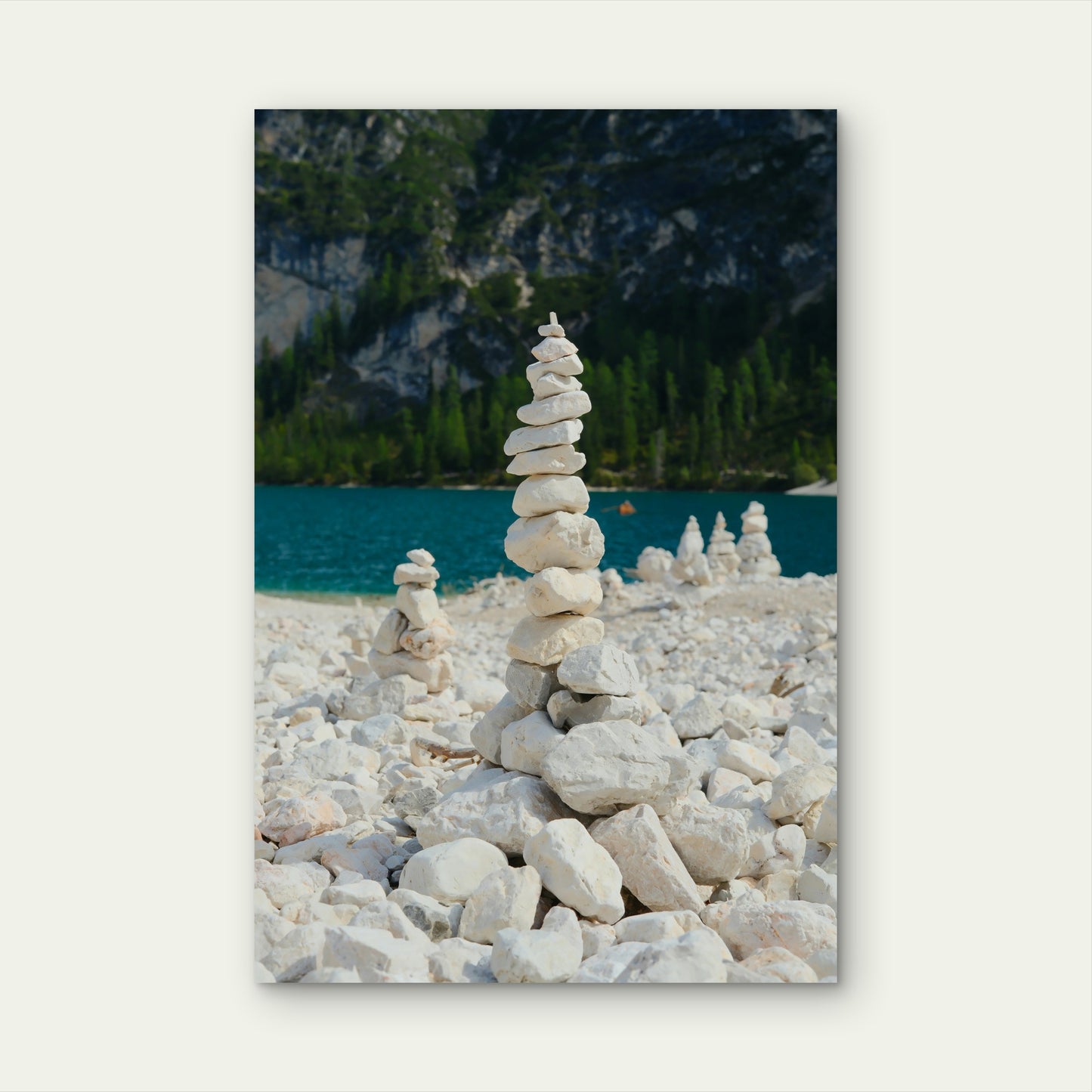 Stack Of White Stones On A Rocky Shore 40x60cm Metal Print Ready to Hang
