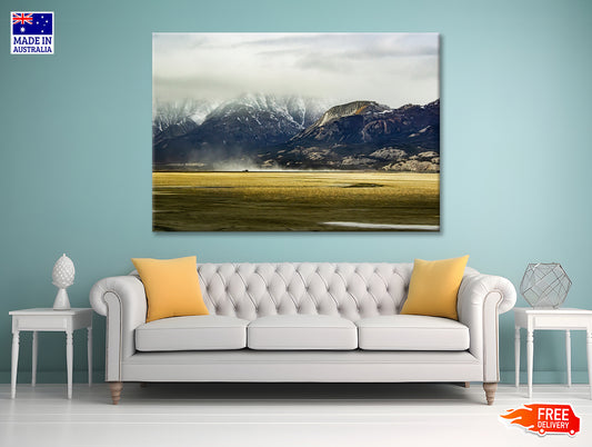 A Field with Mountains, Clouds, Snow, and Grass Print 100% Australian Made