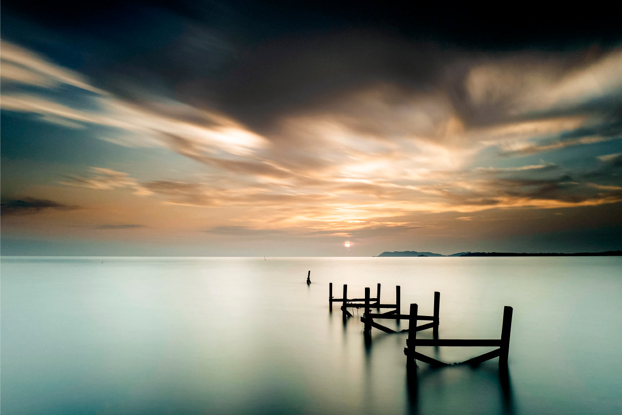 An abandoned wooden jetty sits at sunset in Pasir Panjang, Port Dickson, Malaysia  Wall Art Decor 100% Australian Made