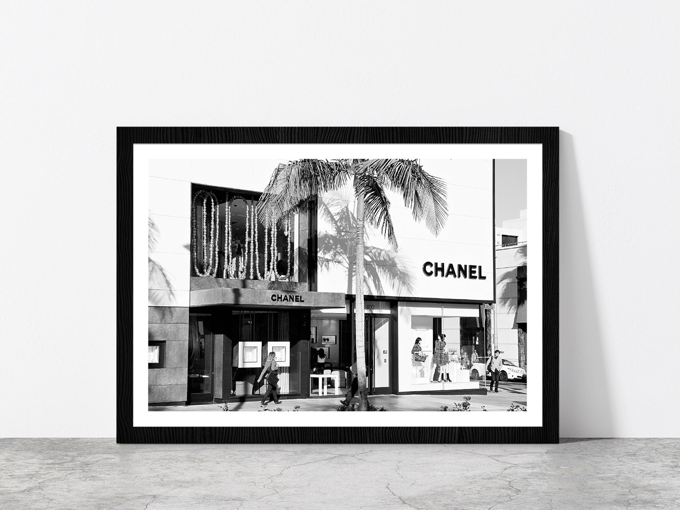 Palm Tree & People near Fashion Store Photograph Glass Framed Wall Art, Ready to Hang Quality Print With White Border Black