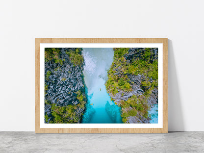 Bay Of Water Surrounded By Cliffs Glass Framed Wall Art, Ready to Hang Quality Print With White Border Oak