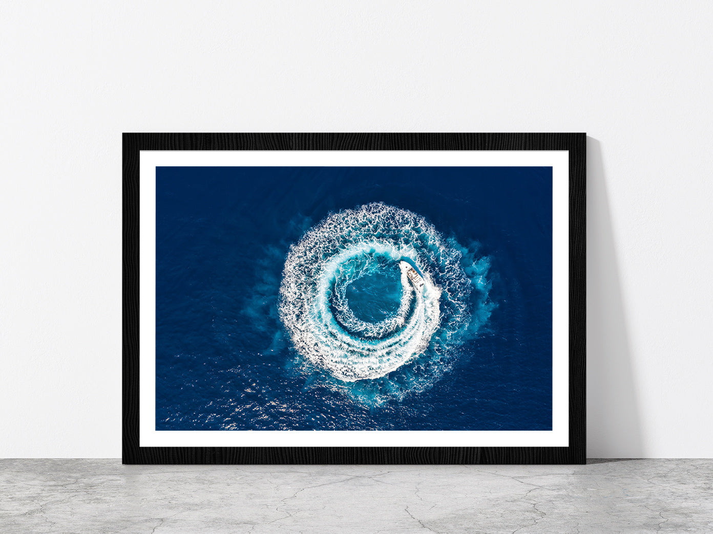 Motorboat Forms A Circle Of Waves Glass Framed Wall Art, Ready to Hang Quality Print With White Border Black