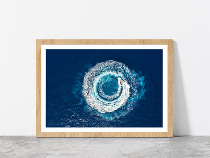 Motorboat Forms A Circle Of Waves Glass Framed Wall Art, Ready to Hang Quality Print With White Border Oak