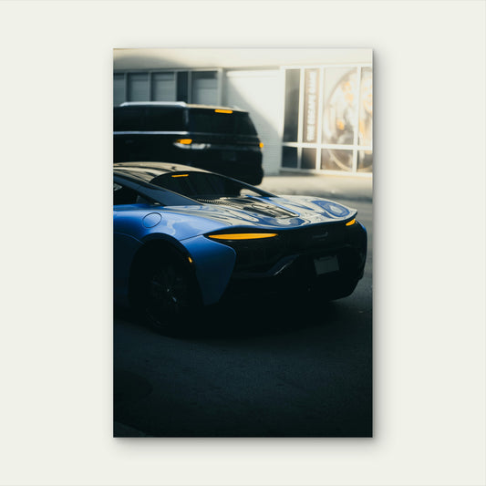 Blue McLaren Artura In Urban Setting 60x90cm Metal Print Ready to Hang