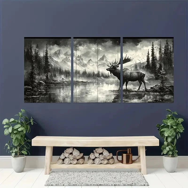 Three-panel wall art of a moose in a forest setting above a wooden bench with firewood.
