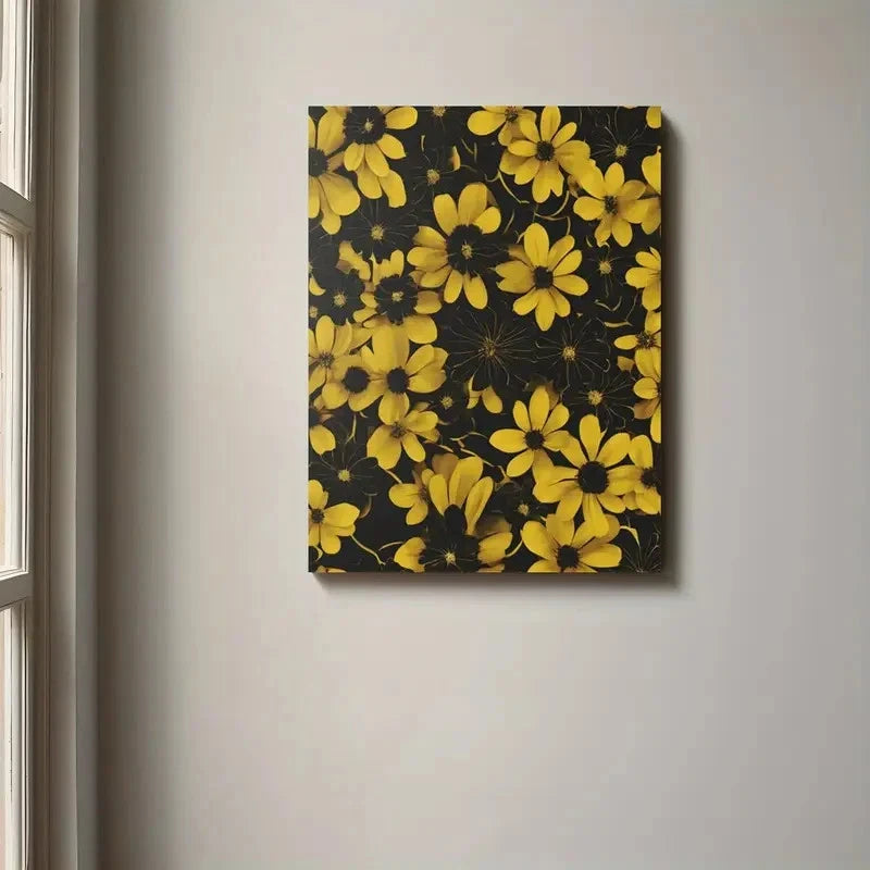 Floral painting with yellow flowers on a dark background hanging on a wall.