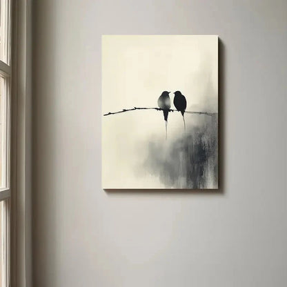 Canvas print of two birds on a wire against a misty background, hanging on a wall.