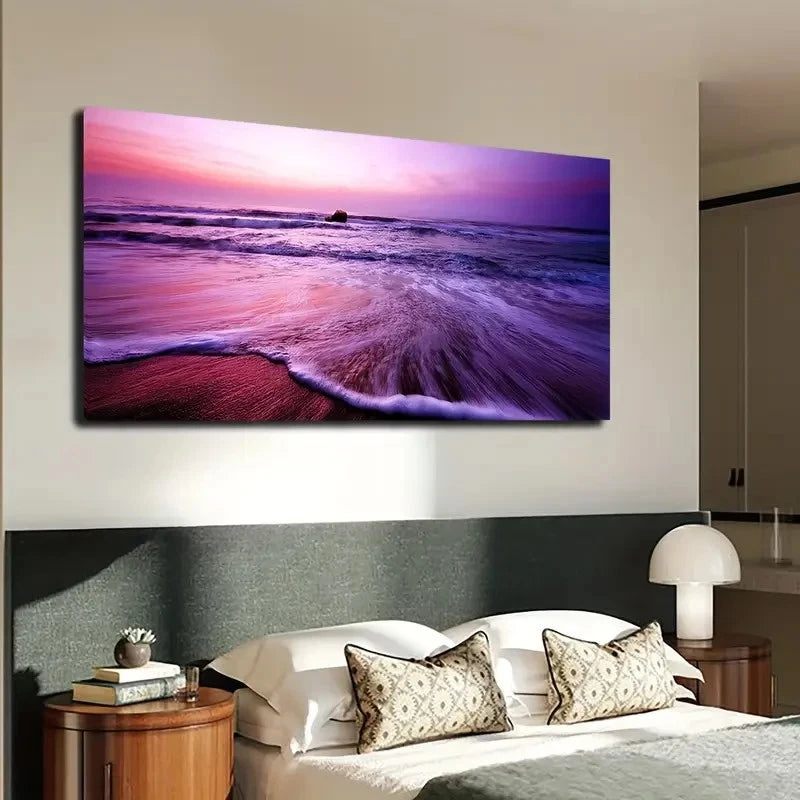 Beach scene painting on a wall above a bed in a bedroom.