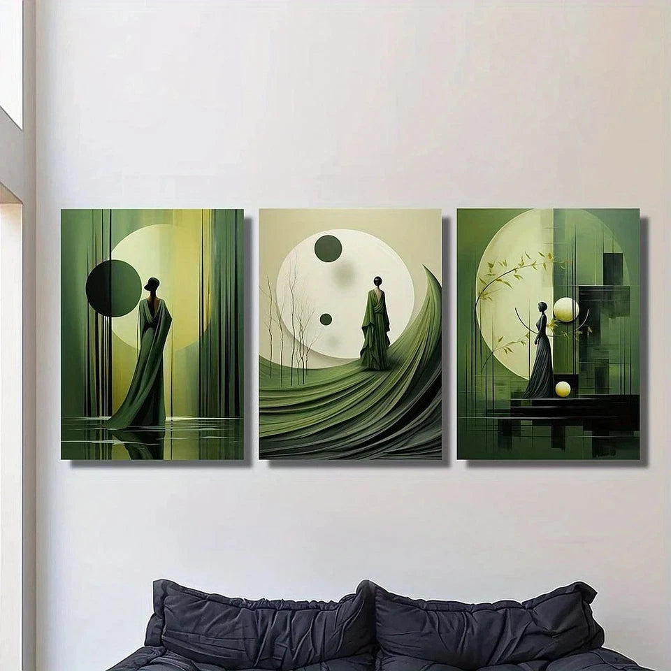 Three abstract art pieces in green tones on a wall above a sofa.