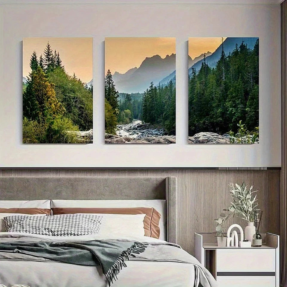 Three landscape paintings above a bed in a bedroom setting.
