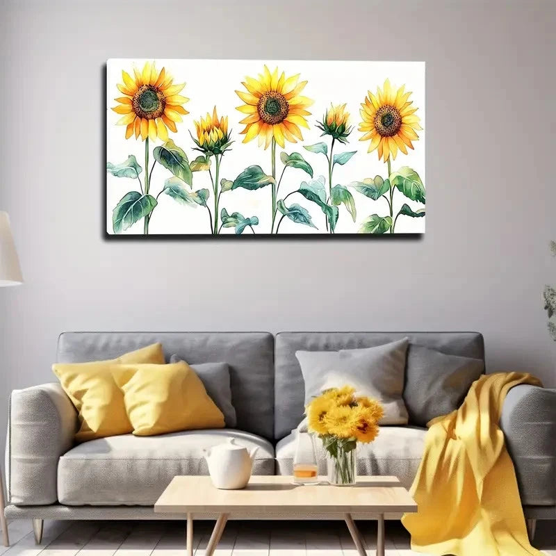 Living room with a gray sofa, yellow pillows, and a sunflower painting on the wall.