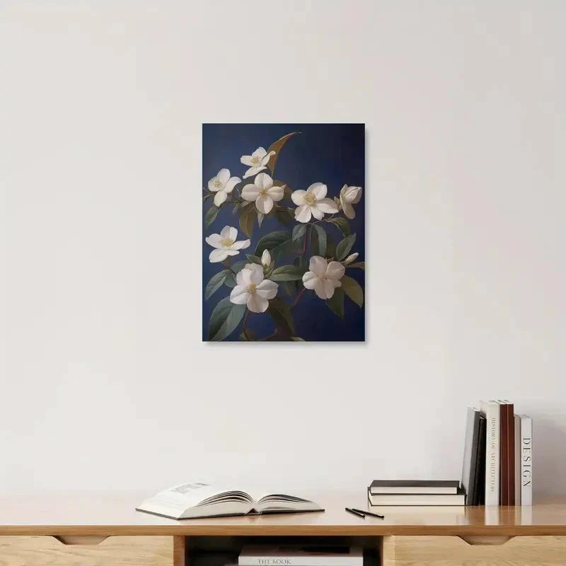 Floral painting on a wall above a wooden shelf with books and an open book.