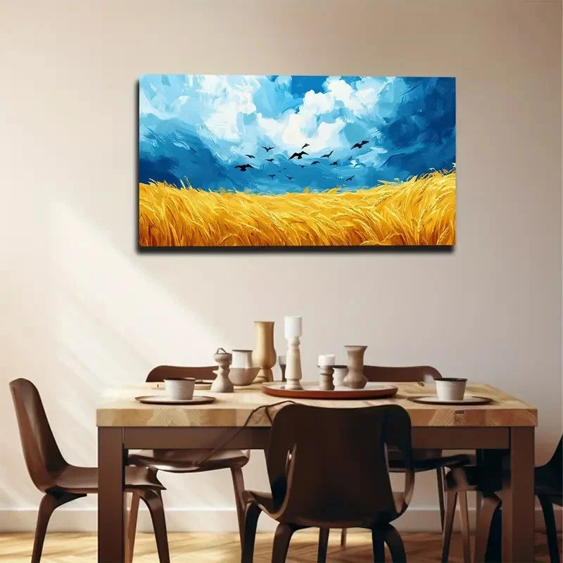 Dining room with a large painting of a wheat field and blue sky.