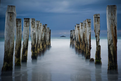 Wooden Pier Remains on a Beach Print 100% Australian Made