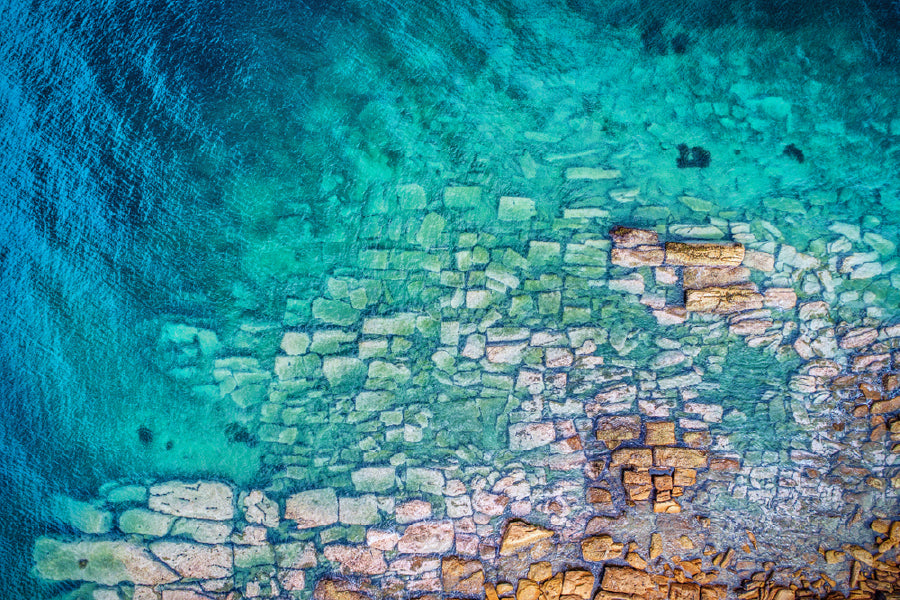 Stones on Clear Sea Water Aerial View Print 100% Australian Made