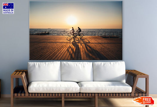 Cyclists Near Sea at Sunset View Print 100% Australian Made